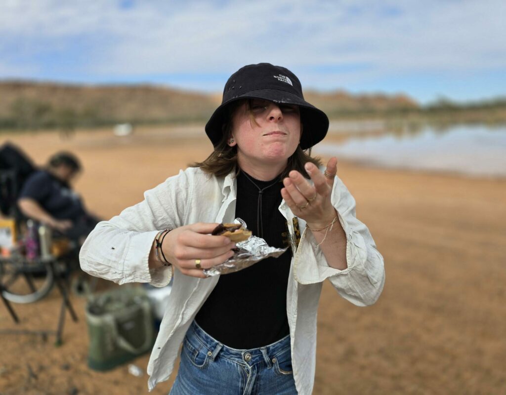 Lucille eating her first smore at Claypans French Wwoofa