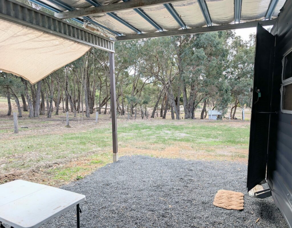 Undercover area beside caravan