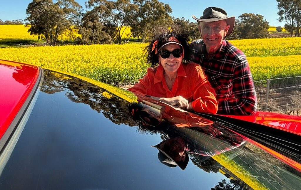 Maddie & Ian & canola crop on way to York W.A.